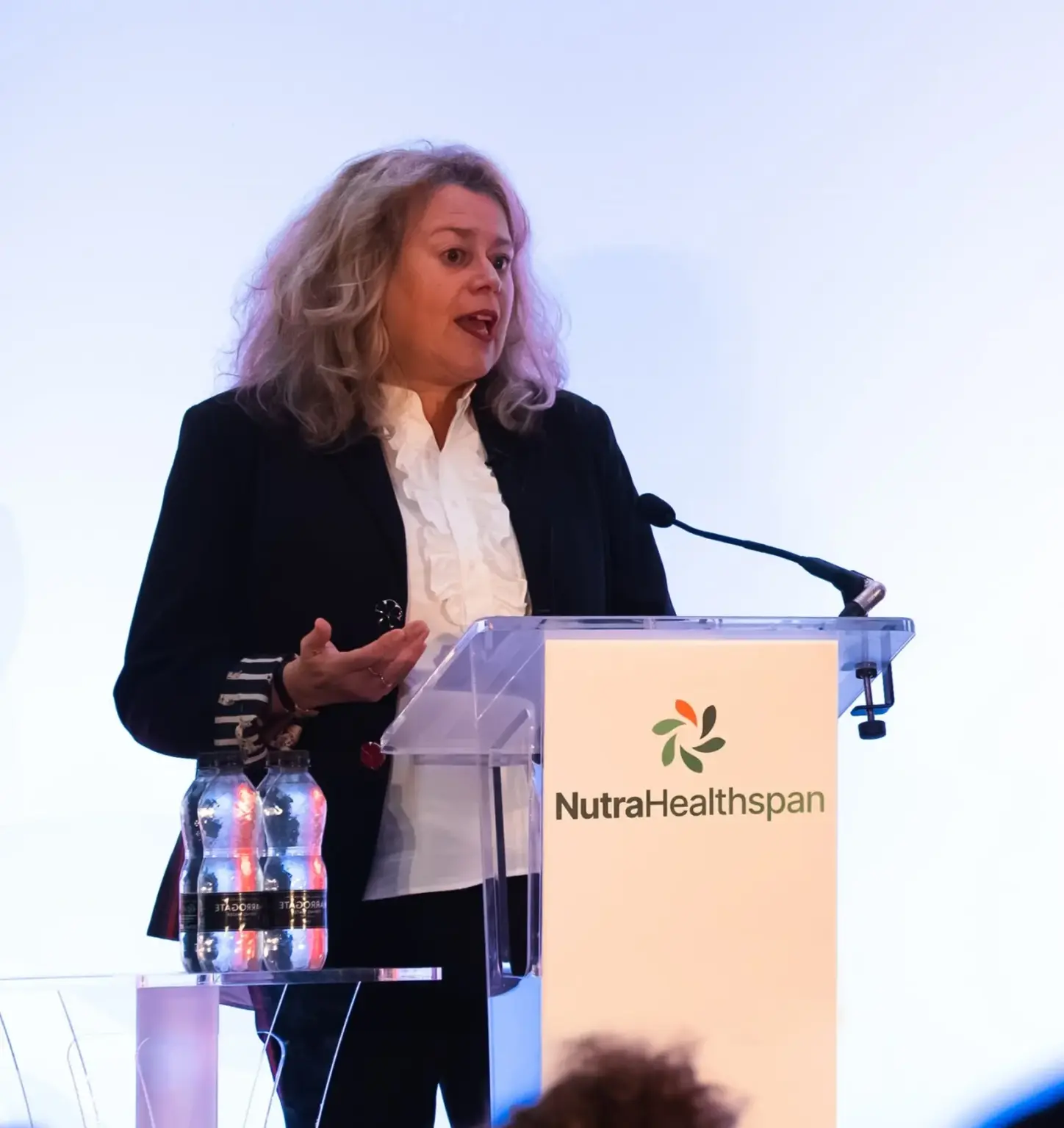 Dr. Sybille Buchwald-Werner at NutraHealthspan conference presenting on stage